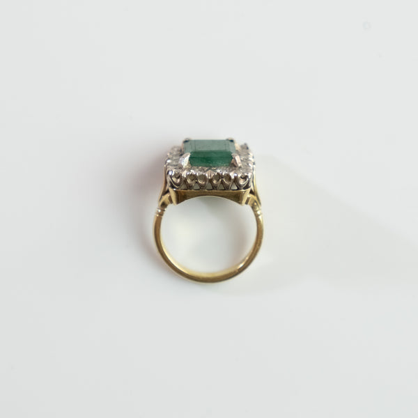 S O L D 1930, LONDON WHITE AND YELLOW GOLD EMERALD AND DIAMOND CLUSTER RING