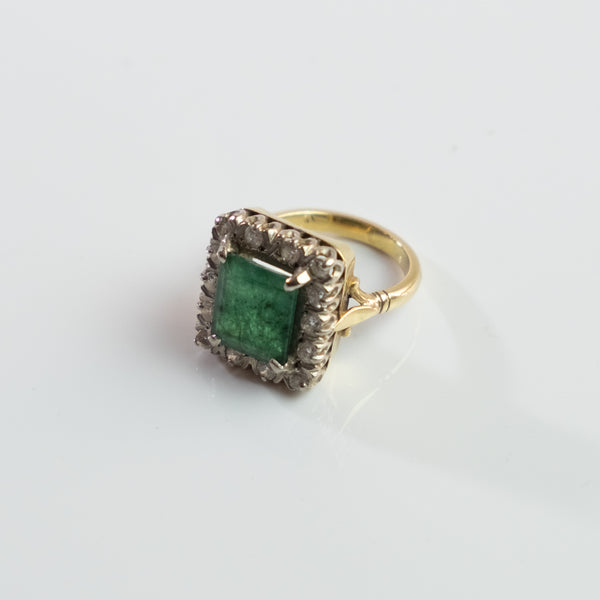 S O L D 1930, LONDON WHITE AND YELLOW GOLD EMERALD AND DIAMOND CLUSTER RING
